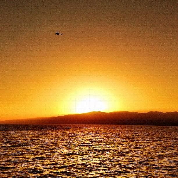 Summer Photograph - Sunset With Helicopter!! by Rick  Annette