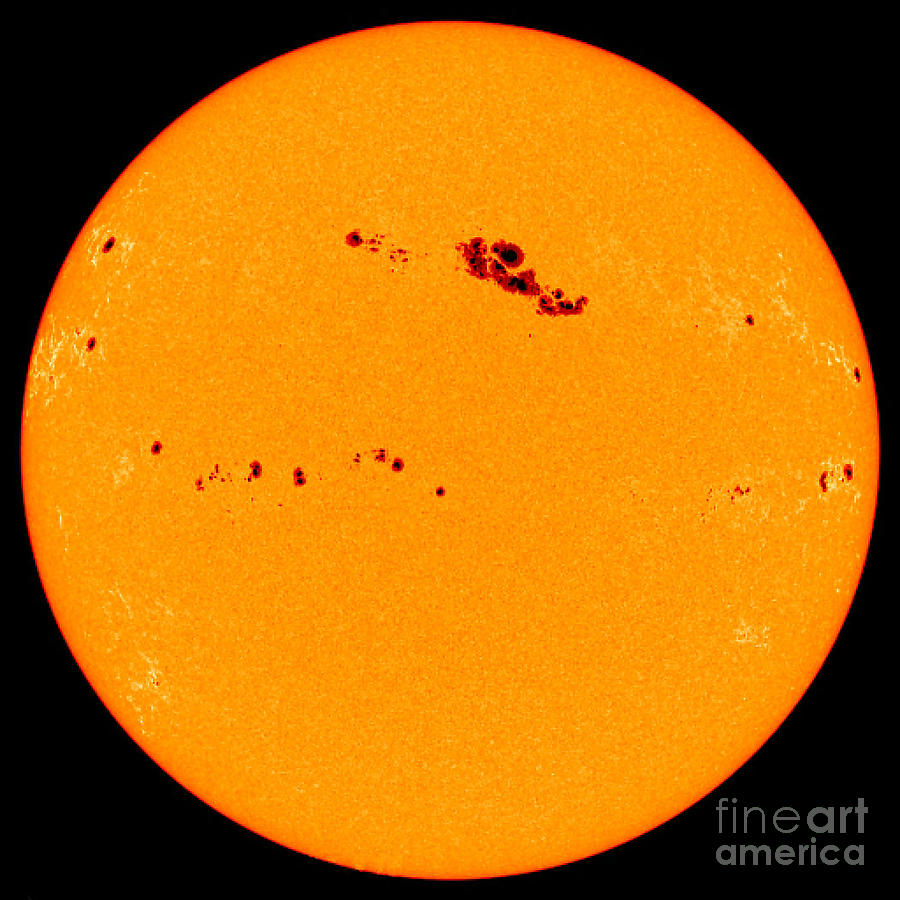 Sunspots On Sun Photograph by NASA Goddard Space Flight Center Scientific Visualization Studio