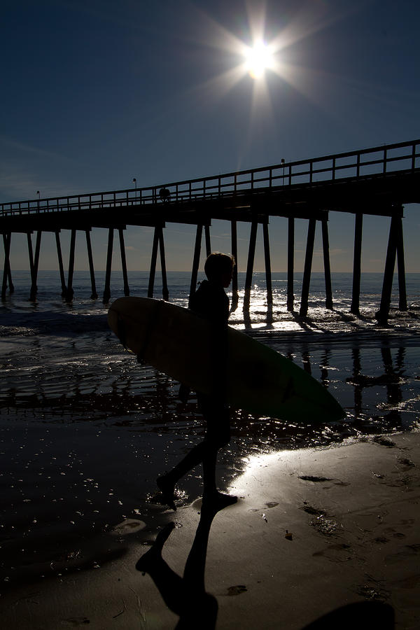 Surfer And The Pier Photograph by Roger Mullenhour