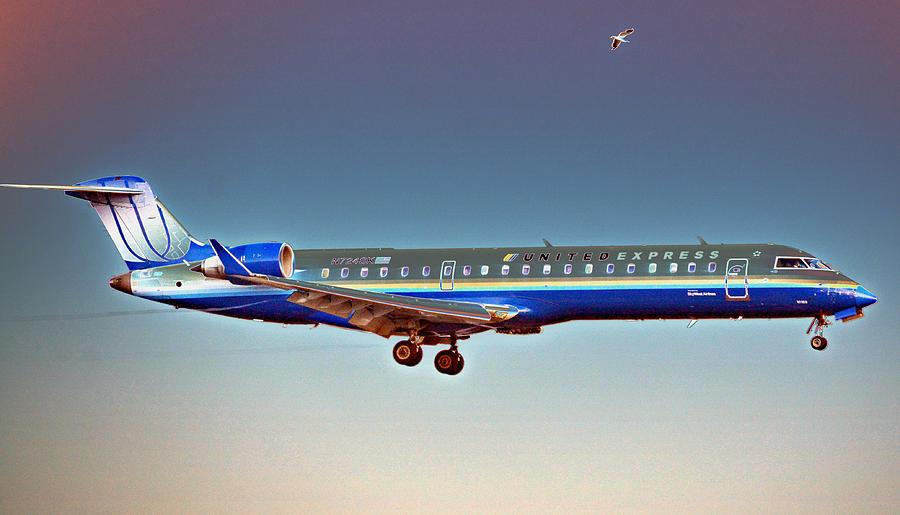 Jet Photograph - Surreal United Express by Fraida Gutovich
