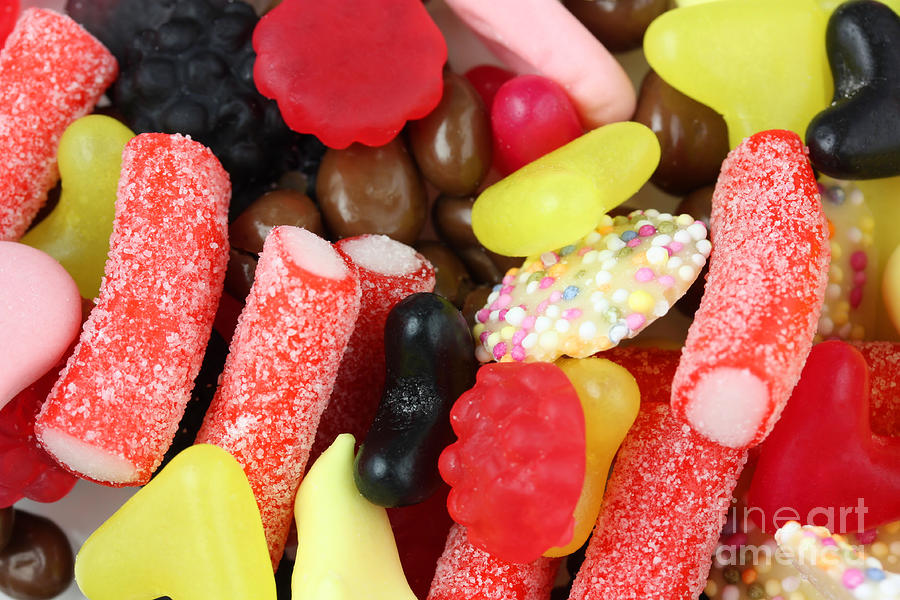 Sweets and candy mix Photograph by Simon Bratt