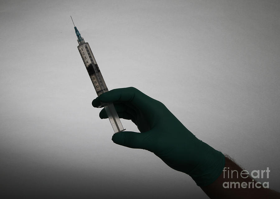 Syringe Photograph by Photo Researchers, Inc.