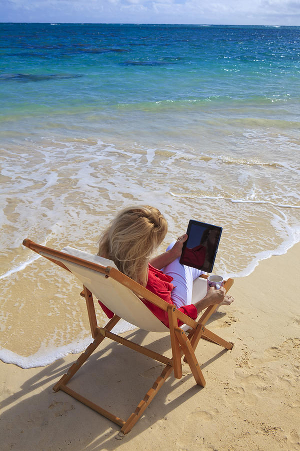 Tablet on Beach Photograph by Tomas del Amo