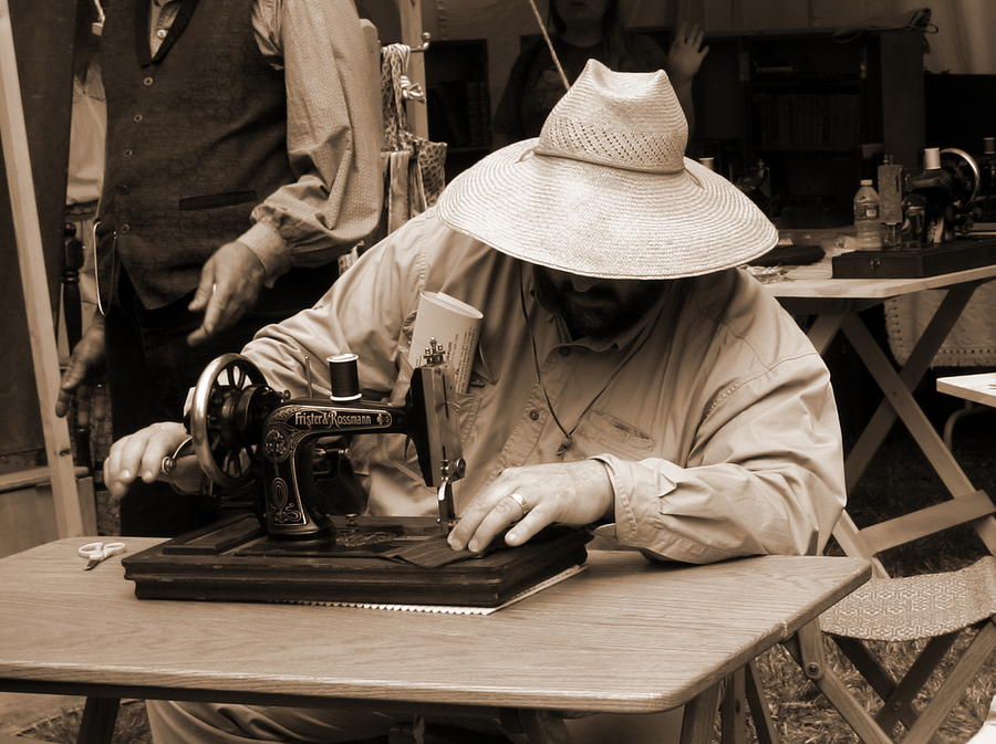 TAILOR using Frister and Rossmann Sewing Machine Photograph by Pristine Cartera Turkus