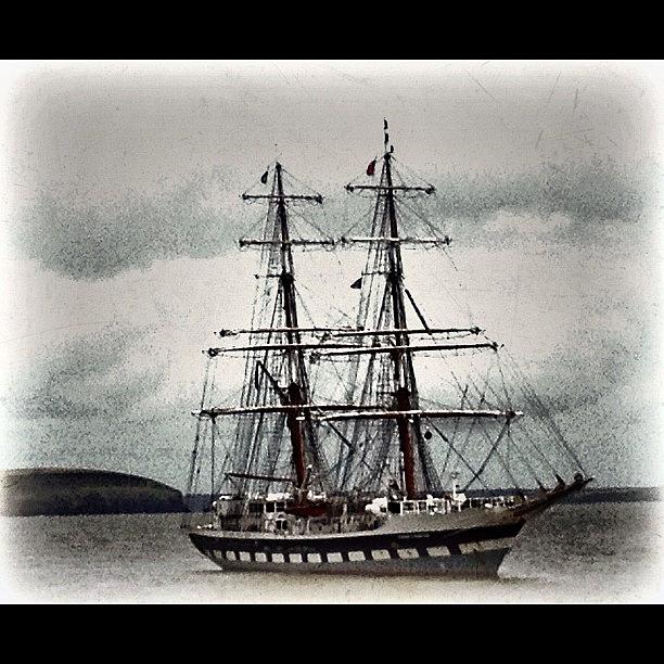 Tallship Photograph - Tall Ship Moored Off Dunmore East by Deasun OSiodhachain