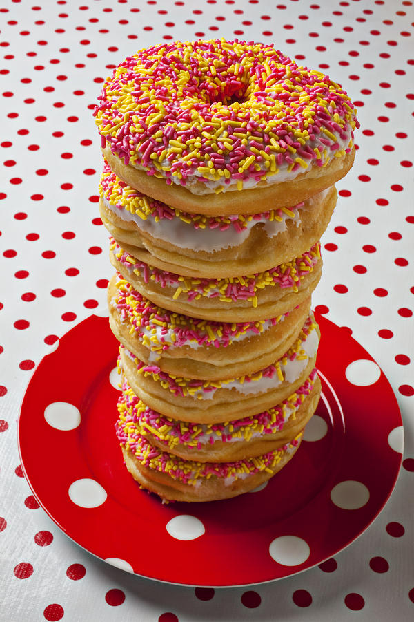 Tall stack of donuts Photograph by Garry Gay