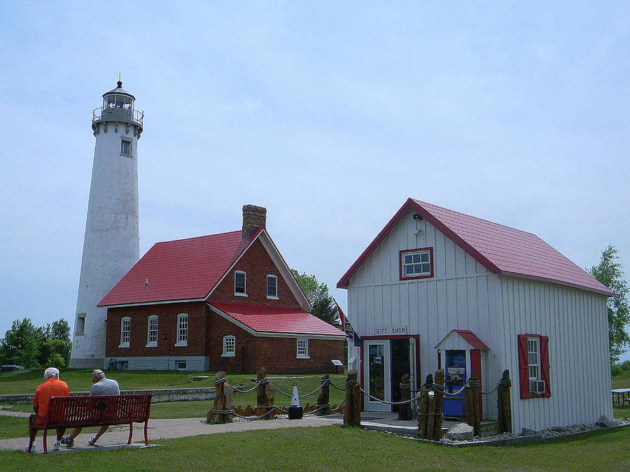 Tawas Point Lighthouse and Store Photograph by Wanda Jesfield