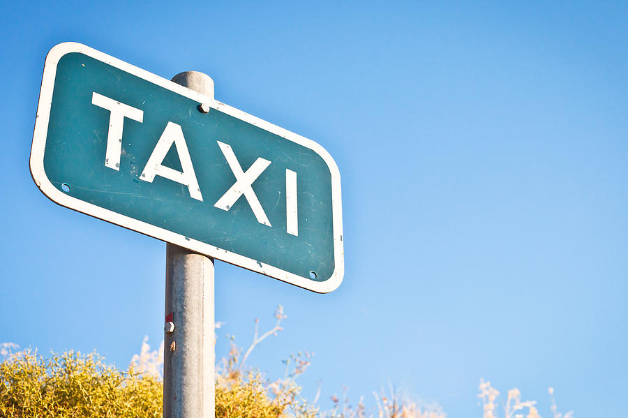 Summer Photograph - Taxi sign by Tom Gowanlock