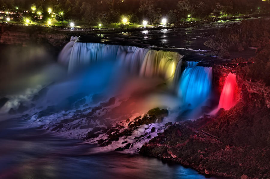 The American Falls Illuminated With Colors Photograph by Mark Whitt