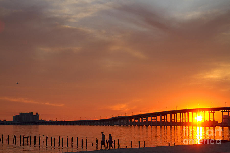 The Biloxi Bay Bridge at Sunset Photograph by David R Frazier and Photo Researchers 