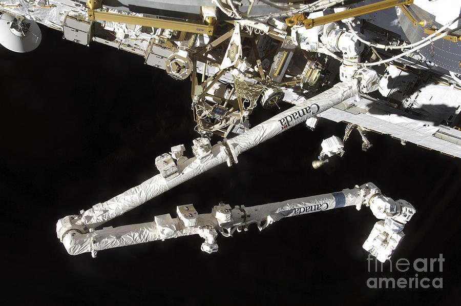 Space Photograph - The Canadian-built Space Station Remote by Stocktrek Images