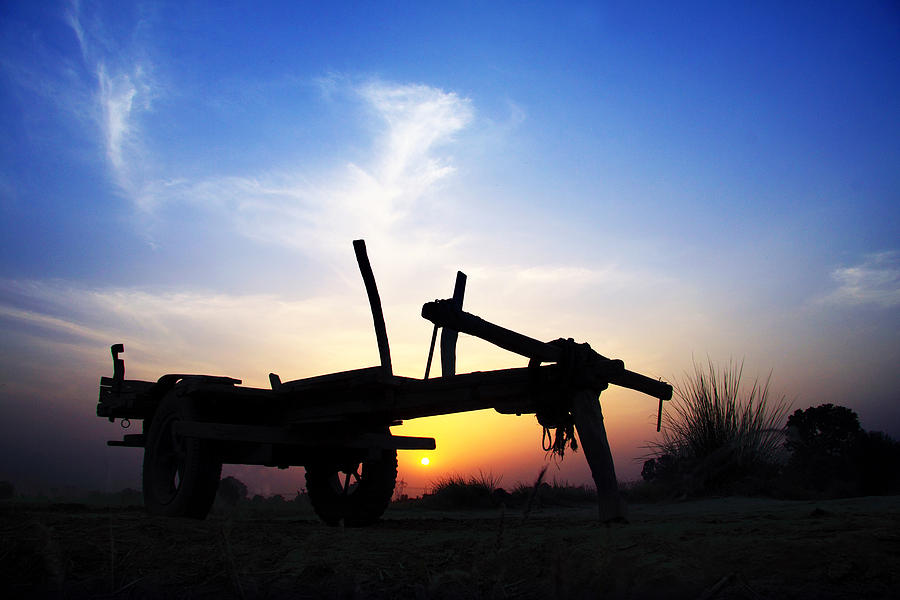 Sunset Photograph - The Cart by Razaq Vance