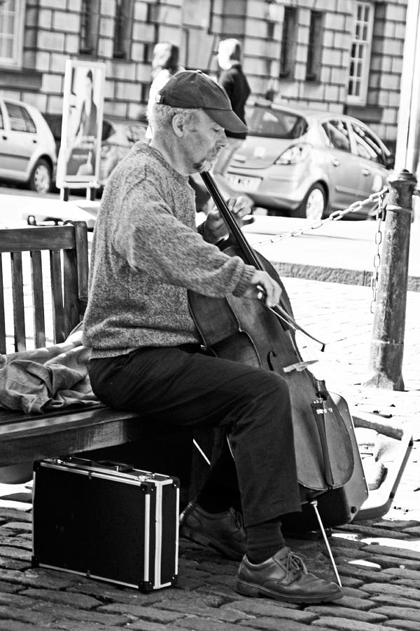 The Cellist on the bench...........  Photograph by Martina Fagan