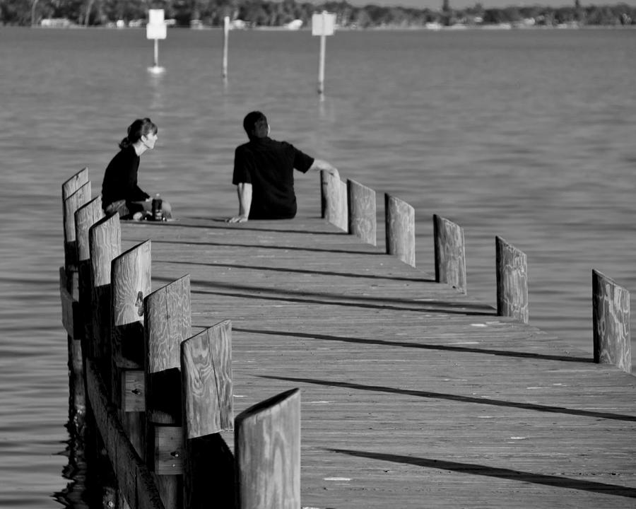 Black And White Photograph - The Conversation by Roger Wedegis