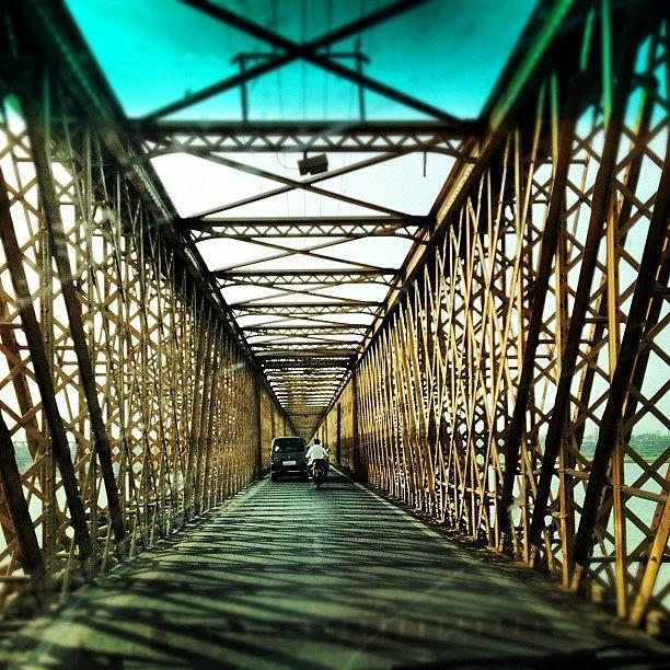 Bridge Photograph - The Enchanting Golden Bridge Over River by Mohammed Ali Rukadikar