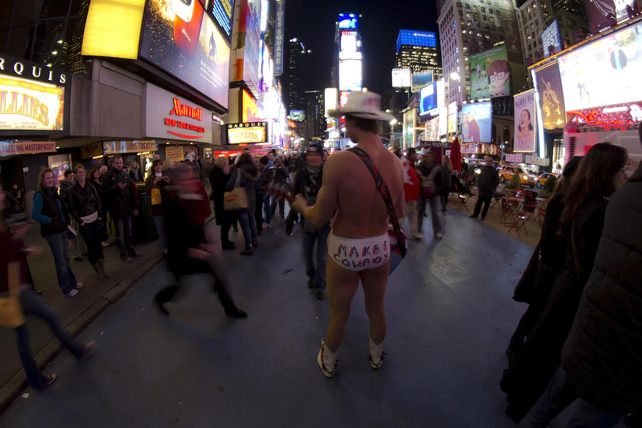 The famous Naked Cowboy performing in Time Square Photograph by Sven Brogren