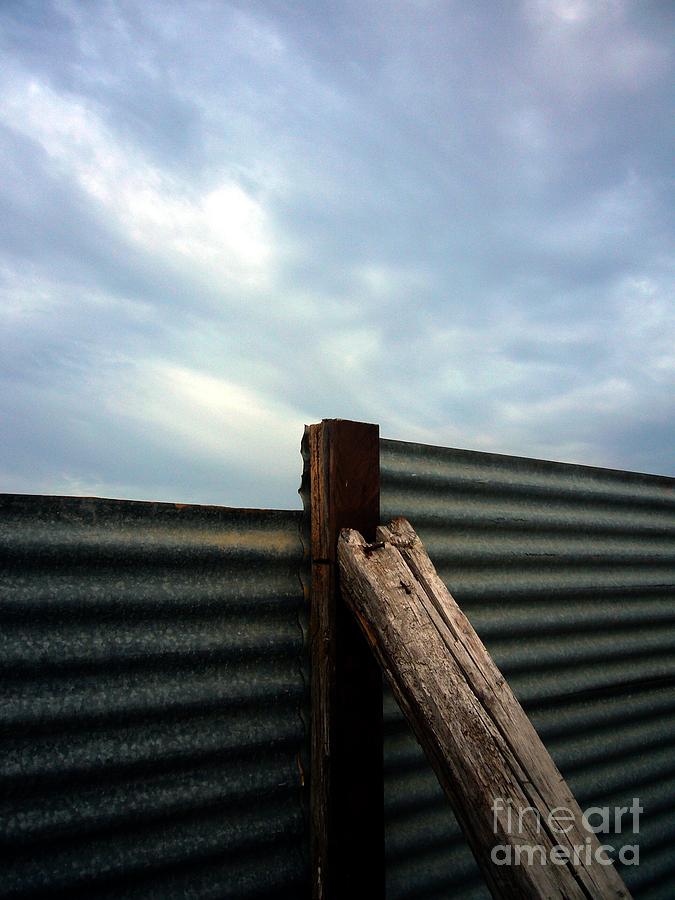 Beach Photograph - The fence the sky and the beach by Andy Prendy