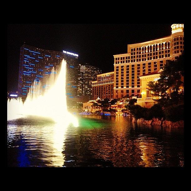 The Fountain Show At The Bellagio Photograph by Jason Antich