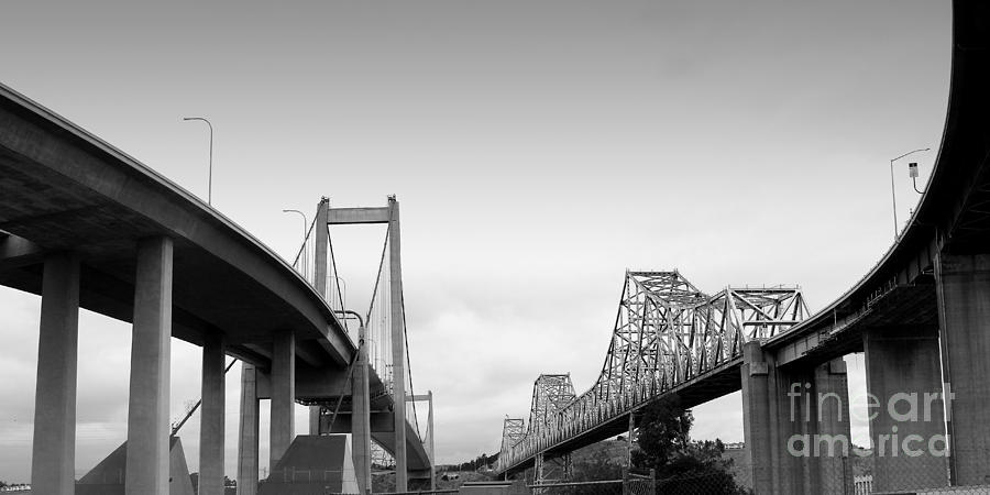The New Alfred Zampa Memorial Bridge and The Old Carquinez Bridge . Black and White . 7D8829 Photograph by Wingsdomain Art and Photography