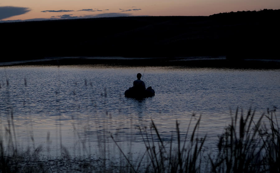 The Night Fisherman Floats Photograph by Lorraine Devon Wilke