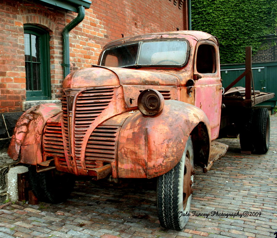 The Old Red Truck Photograph by Jale Fancey