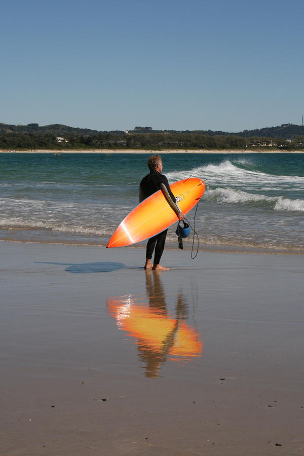 The Orange Surfboard Photograph by Jan Lawnikanis