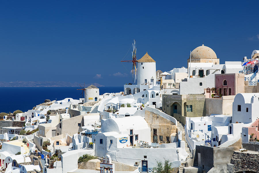 The Small Greek Village Of Oia Santorini Island Photograph by Sylvain ...