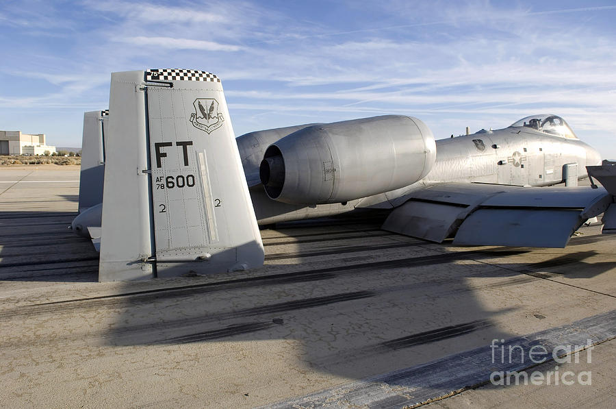 Airplane Photograph - The Tail Section Of An A-10 Thunderbolt by Stocktrek Images