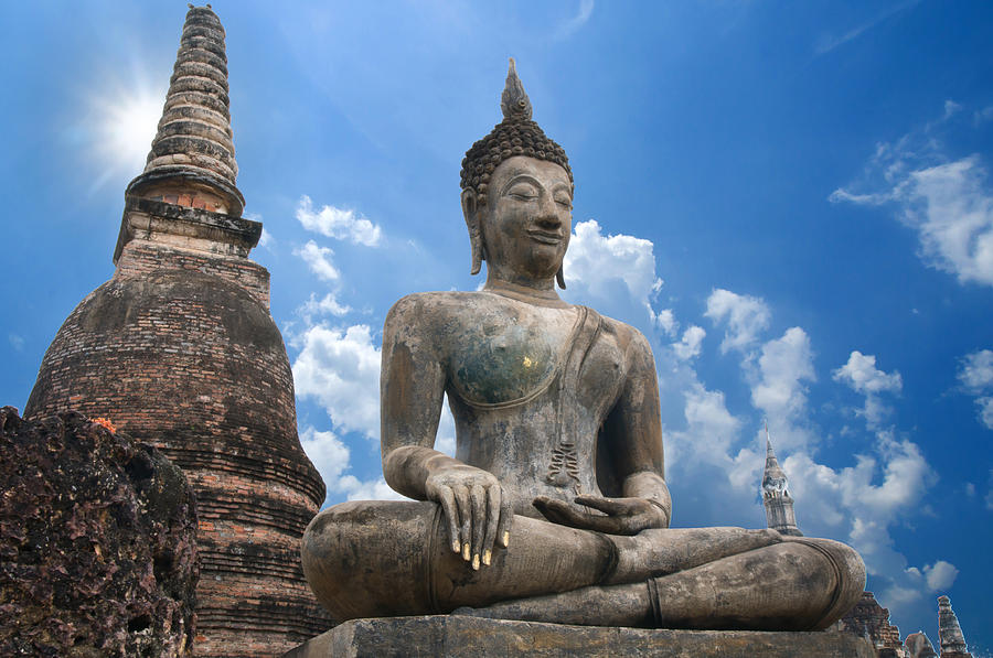 The Tian Tan Buddha in a dramatic sky background Photograph by ...