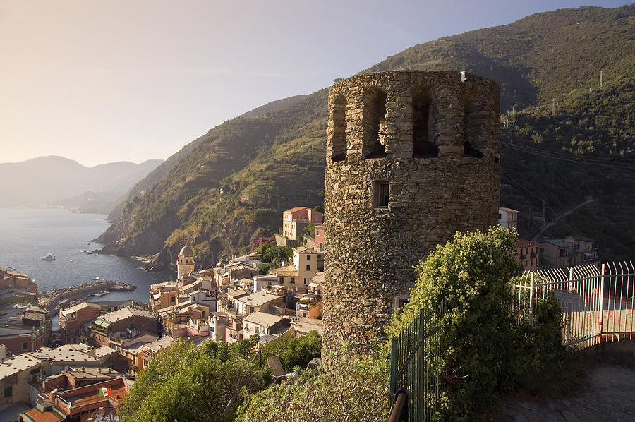 The Torre di avvistamento and the town of Vernazza Photograph by Rod Jones