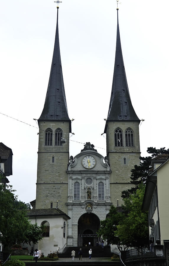 The twin spires of Hof Church in Lucerne Photograph by Ashish Agarwal