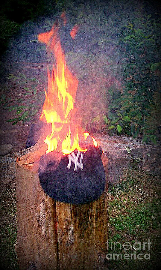 burning yankees hat