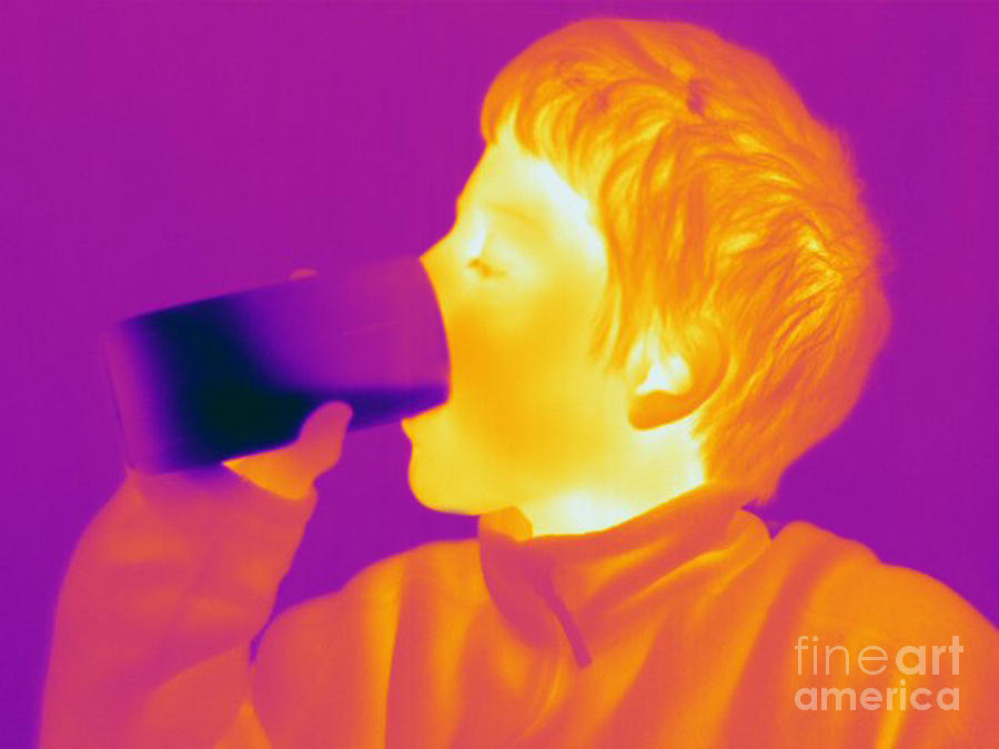 Thermogram Of A Boy Drinking Photograph by Ted Kinsman