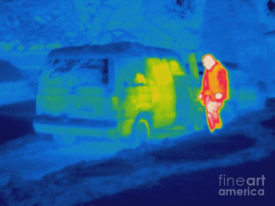 Thermogram Of A Man Working On A Car Photograph by Ted Kinsman