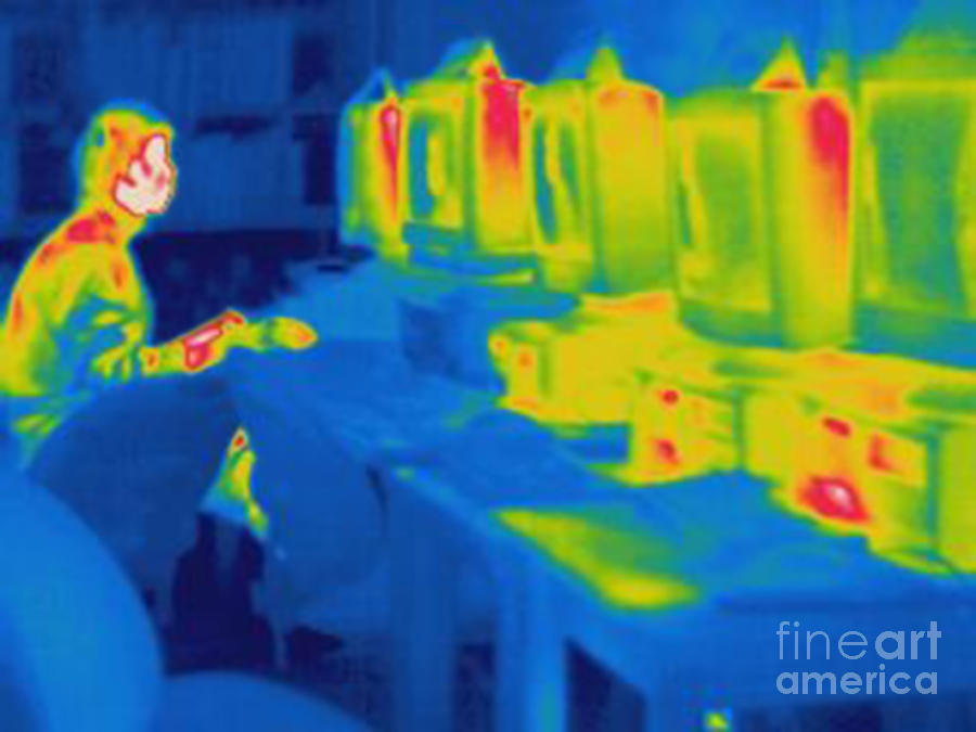 Thermogram Of A Man Working On Computer Photograph by Ted Kinsman