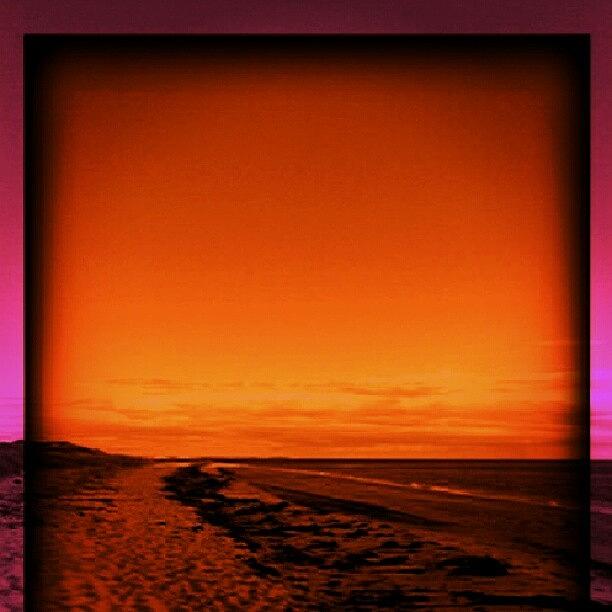 Beach Photograph - Through Colored Glass by Stan Homato