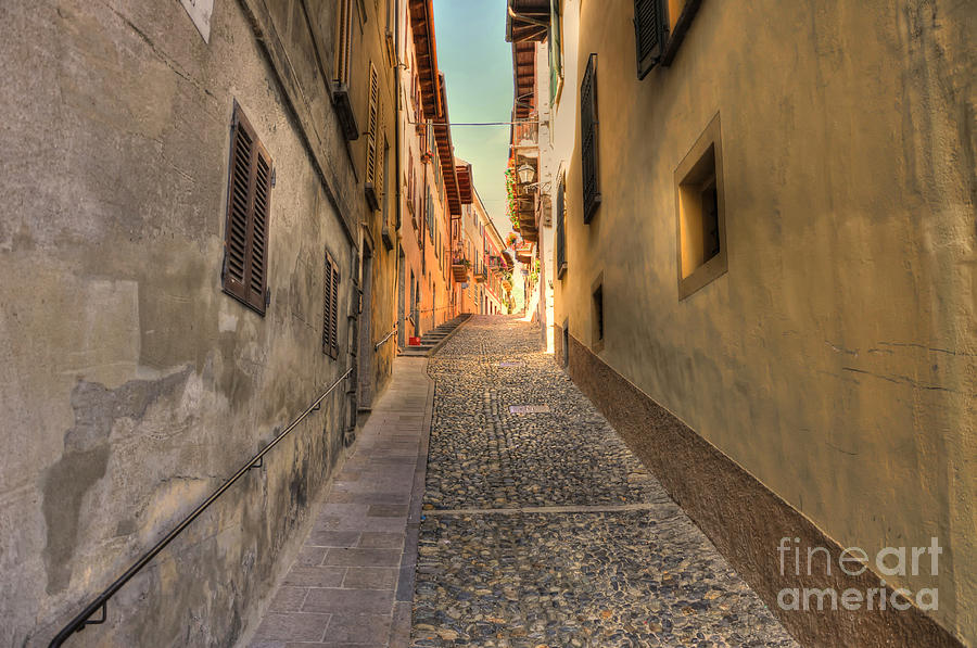 Alley Photograph - Tight alley with sunlight by Mats Silvan