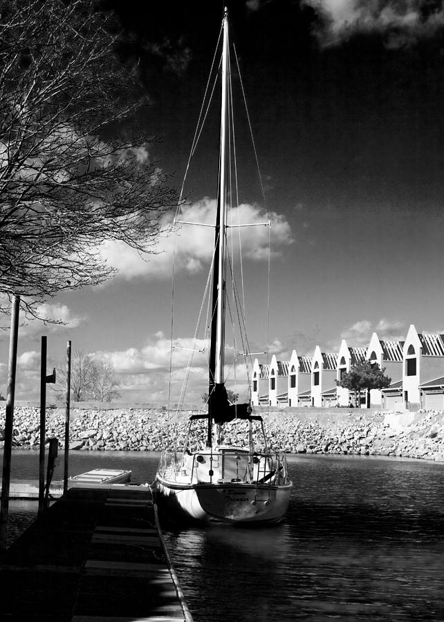 Tiny Sailboat in Infra Red Photograph by Kathy Clark