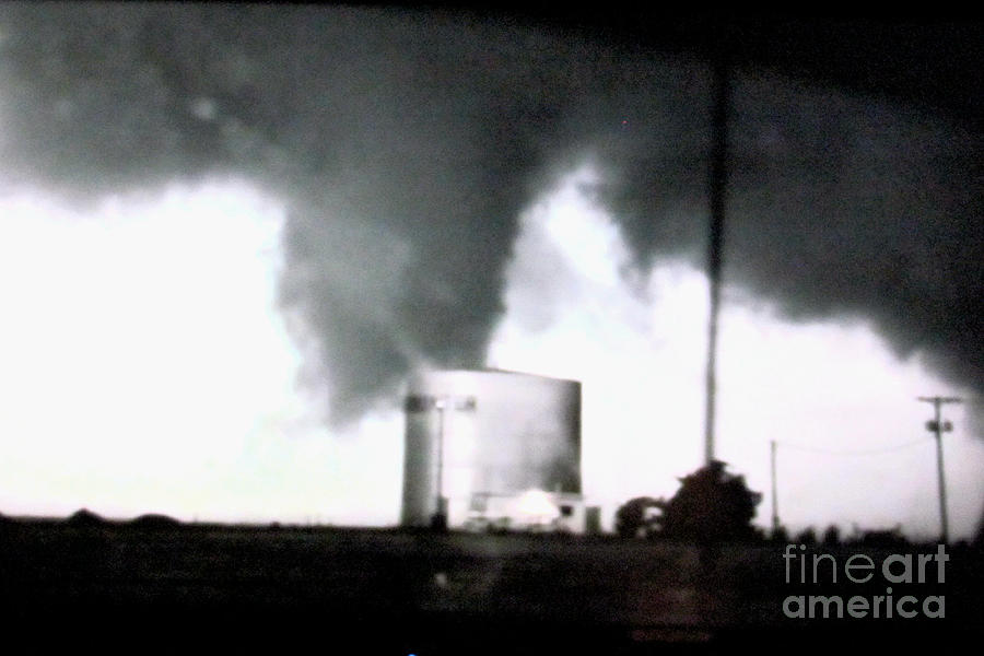Tornado attacks a water tower Photograph by Stanley Morganstein