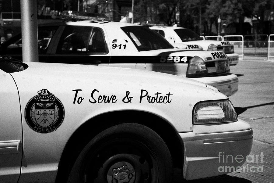 Car Photograph - Toronto Police Squad Cars Outside Police Station In Downtown Toronto Ontario Canada by Joe Fox