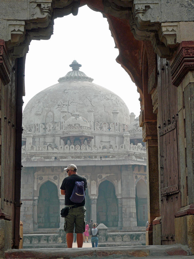 Tourist framed in archway while photographing the Humayun Tomb Photograph by Ashish Agarwal