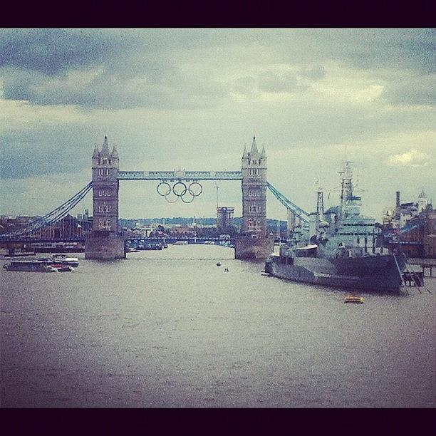 Tower Bridge With Olympic Rings And Hms Photograph by Keith Morrell