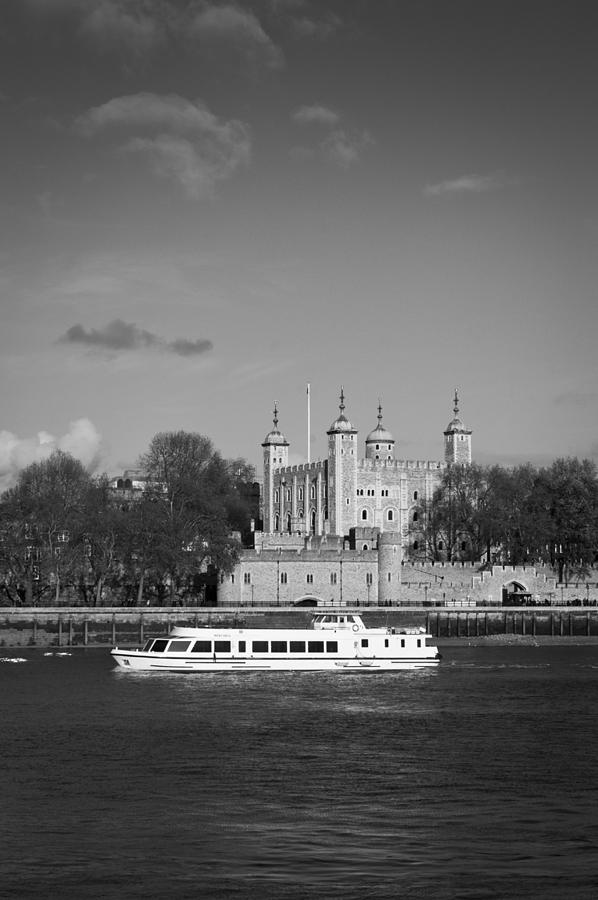 Tower of London with tourist boat Photograph by Gary Eason