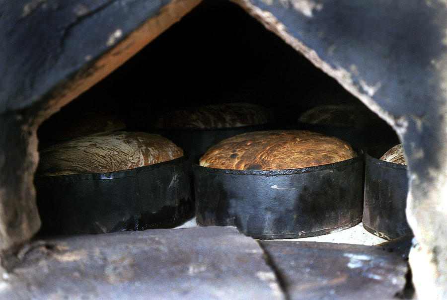 Traditional bread in oven Photograph by Emanuel Tanjala