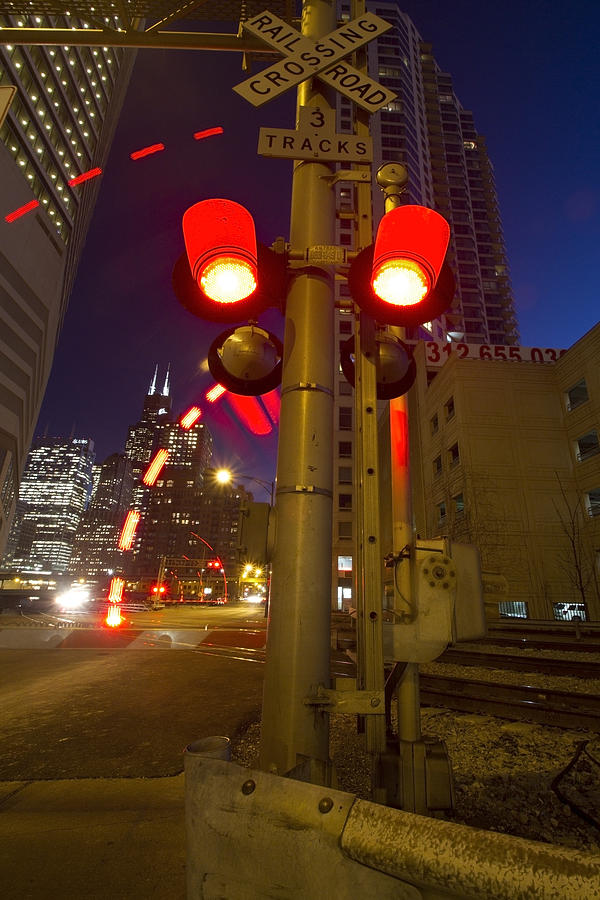 Train crossing lights at dusk Photograph by Sven Brogren