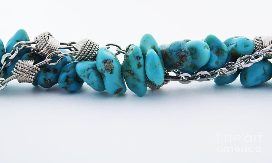 Jewelry Photograph - Turquoise stones and silver chain by Blink Images