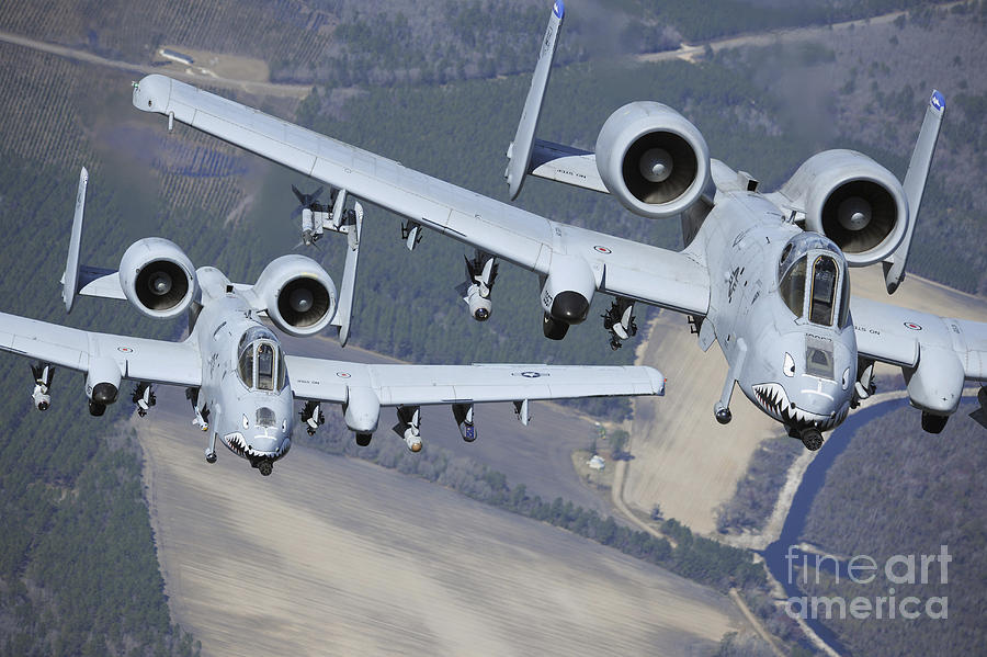 Two A-10c Thunderbolt II Aircraft Fly Photograph by Stocktrek Images