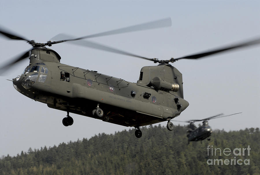 Two Ch-47 Chinook Helicopters In Flight Photograph by Stocktrek Images