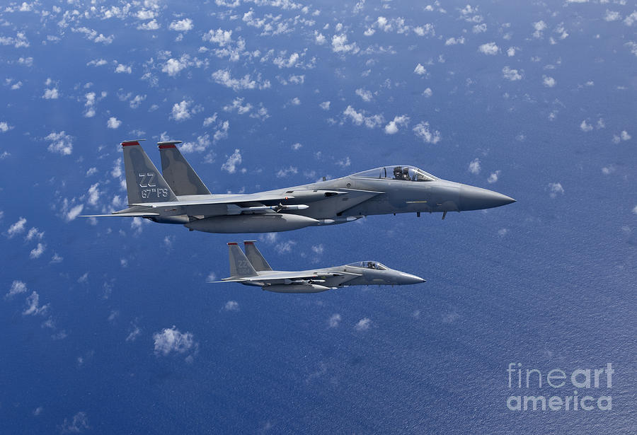 Transportation Photograph - Two F-15 Eagles Flies Over The Pacific by HIGH-G Productions