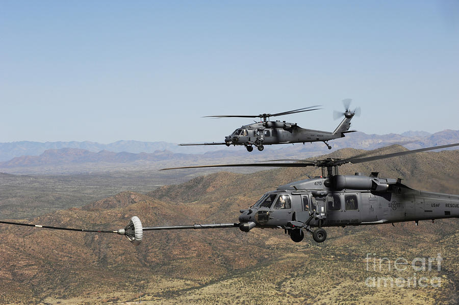 Desert Photograph - Two Hh-60 Pave Hawks Refuel by Stocktrek Images